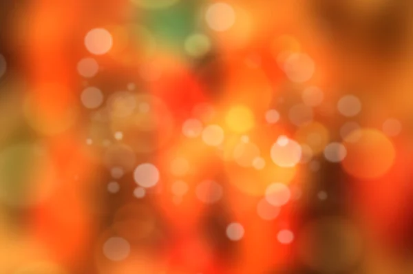 Rode en oranje bokeh. abstracte kleurrijke achtergrond — Stockfoto