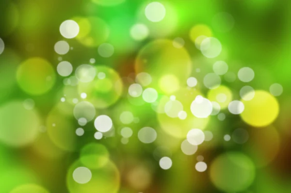 Abstracte ronde groene bokeh achtergrond. — Stockfoto