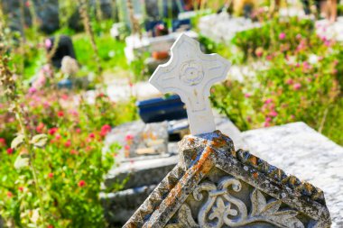 Close up of cross in an old Cemetery clipart