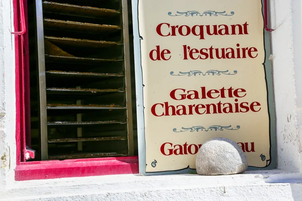 Panel under windows of french typical pastry — Stock Photo, Image