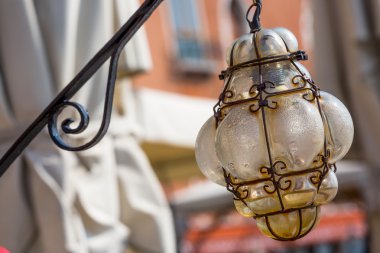 Beautiful venetian ornate lampposts with murano glass. Venice, Italy. clipart