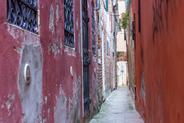 Narrow vintage street in Venice, Italy