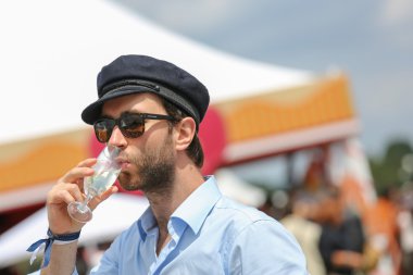 CHANTILLY - JUNE 15 : Lifestyle at Prix de Diane in racecourse, near Paris on June 15, 2014, France. clipart