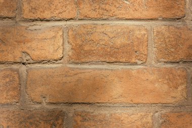 Eski kırmızı tuğla duvar. Tasarım için klasik arkaplan.