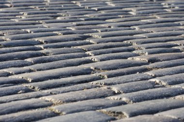 Eski kaldırım taşları kapanıyor. Taş zemin. Retro tarzı. Sığ alan derinliği.