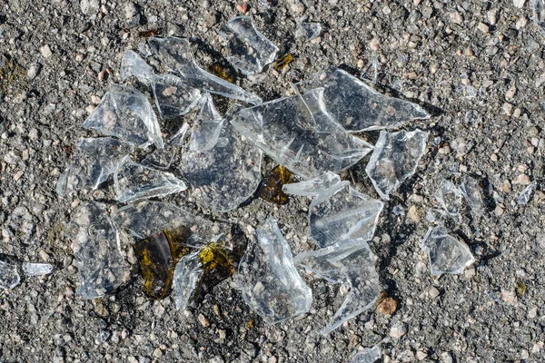 Broken glass. Glass shards background. Selective focus.