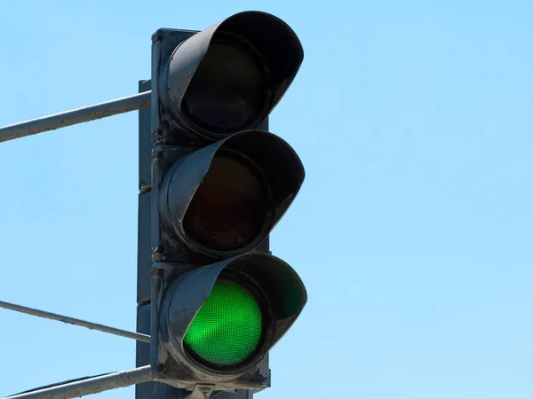 Traffic light green. Traffic control on roads. Keep driving!
