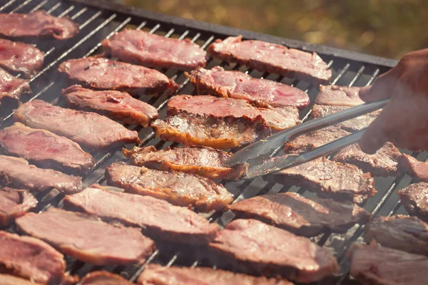 Roasted meat on the grill, parrilla, asado — Stock Photo, Image