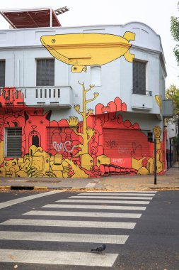 BUENOS AIRES, ARGENTINA - ABRIL 4: Colorful street art in Palerm clipart