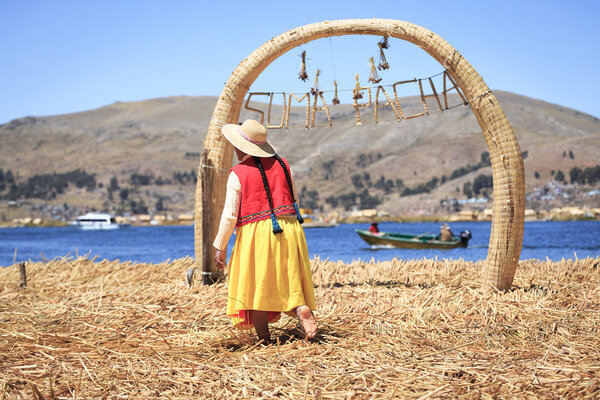 PUNO, PERU - SEPTEMBER 14: Unidentified people in traditional dr