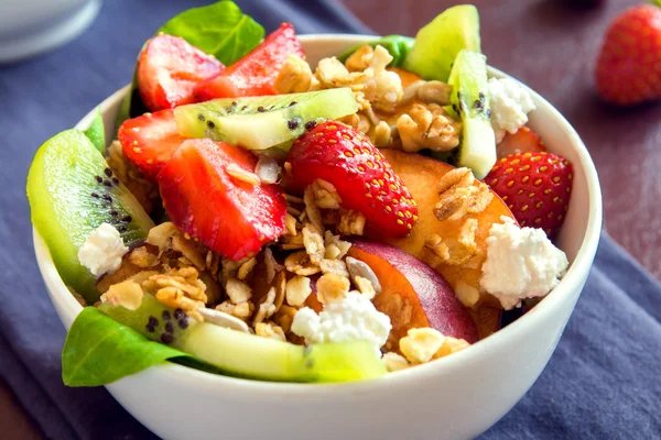 Fruit salad with granola — Stock Photo, Image