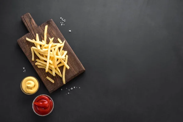 French Fries Board Ketchup Cheese Sauce Top View Copy Space — Stock Photo, Image