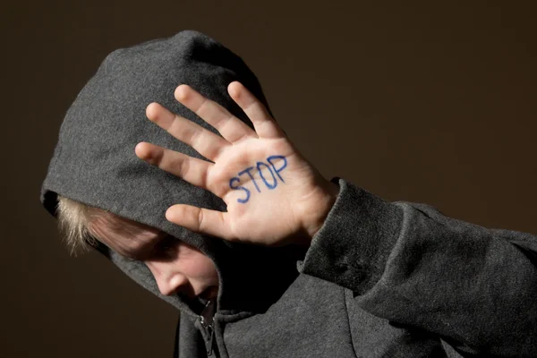 Abused crying child Stock Photo