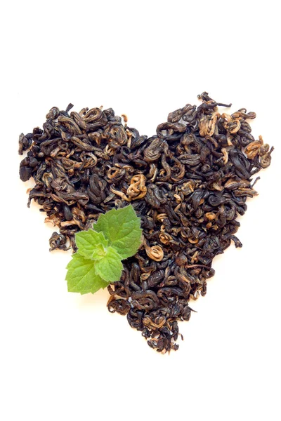 Suchý černý čaj srdce tvar — Stock fotografie