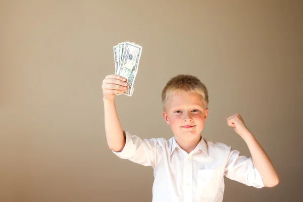 Niño con dinero (dólares ) —  Fotos de Stock