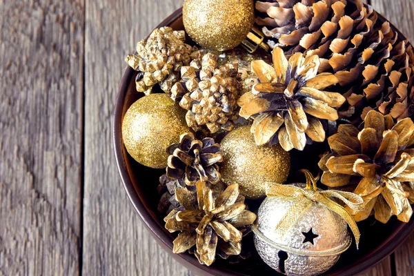 Christmas ornaments and cones — Stock Photo, Image