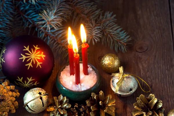 Christmas candles and ornaments Stock Image