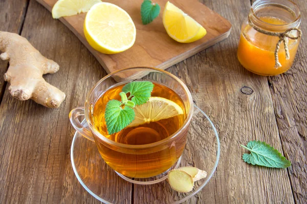 Tea with lemon, ginger, honey and mint — Stock Photo, Image