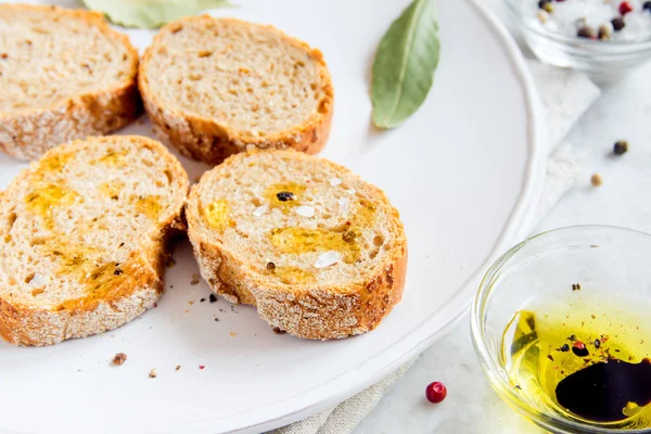 Ciabatta bread with olive oil — Stock Photo, Image