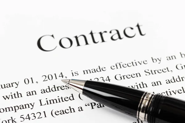 Business contract document focus on pen — Stock Photo, Image