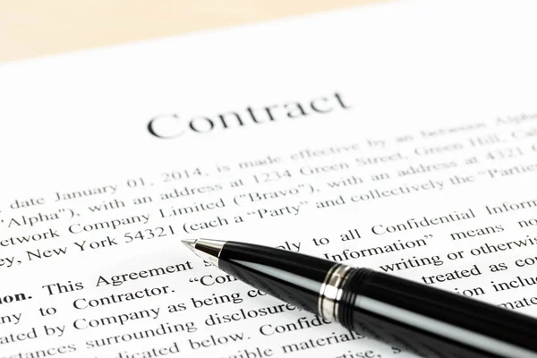 Business contract document focus at pen — Stock Photo, Image