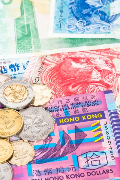 Hong Kong dollar money banknote close-up with coins — Stock Photo, Image
