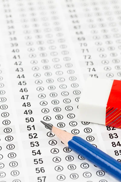 Blanked answer sheet with eraser focus on pencil — Stock Photo, Image