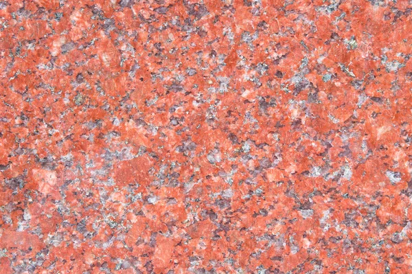 抛光的红粒花岗岩作为背景 — 图库照片