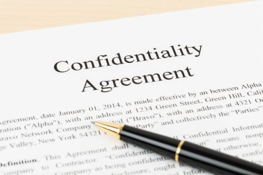 Confidentiality agreement document with pen close-up clipart
