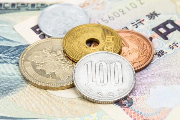 Nota e moedas de iene de moeda japonesa close-up — Fotografia de Stock