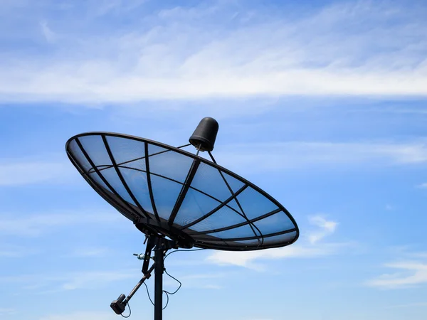 Home satellite dish receiver with blue sky — Stock Photo, Image