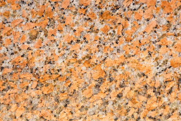 Granit polerowany pomarańczowy ziarna jako tło — Zdjęcie stockowe