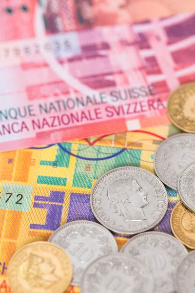 Switzerland money swiss franc banknote and coins close-up (focus — Stock Photo, Image