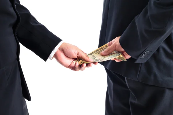 Zakenman geld ontvangen door zijn terug concept voor corruptie — Stockfoto