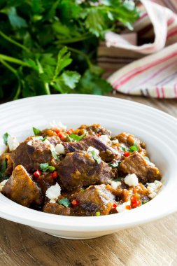 Traditional meat stew with beef, vegetables, feta cheese, homema
