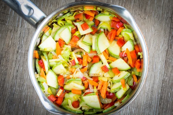 Cooking vegetable soup in pan, vegetarian summer dish, meatless — Stock Photo, Image