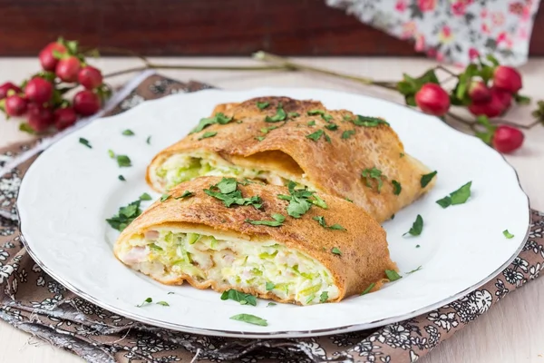 Roll from pancakes with zucchini, ham, cheese, creamy taste, bre — Stock Photo, Image