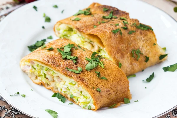 Roll from pancakes with zucchini, ham, cheese, creamy taste, bre — Stock Photo, Image