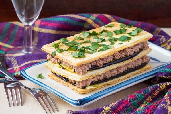 French appetizer millefeuille with eggplant, cream of beans, mea — Stock Photo, Image