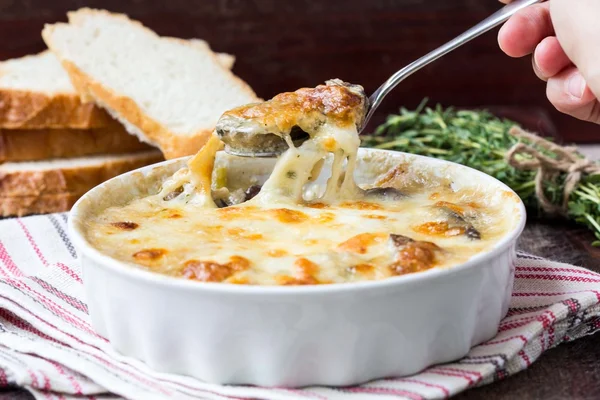 Mushrooms gratin with cream, cheese, French dish julienne — Stock Photo, Image