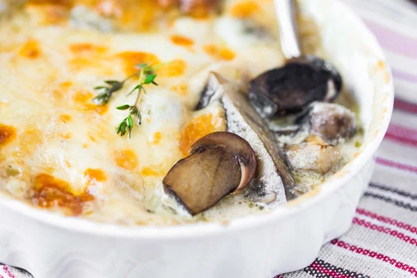 Mushrooms gratin with cream, cheese, French dish julienne — Stock Photo, Image