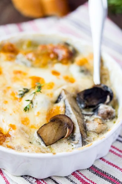 Mushrooms gratin with cream, cheese, French dish julienne — Stock Photo, Image