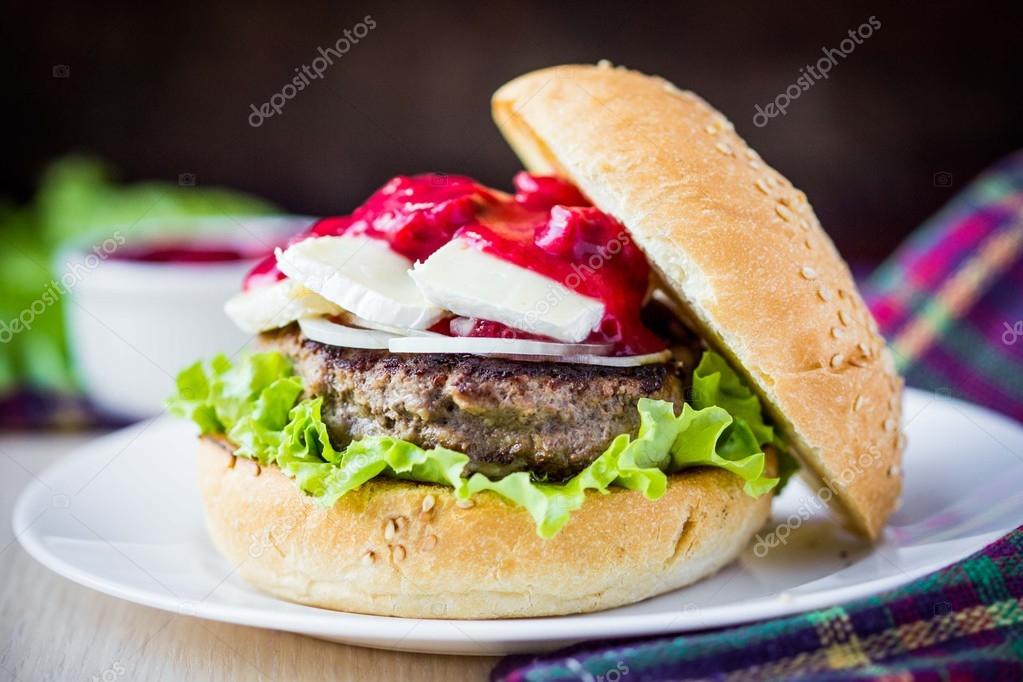 Burger, hamburger with meat, cheese brie, camembert, berry cherr Stock Photo by ©MariaLapina