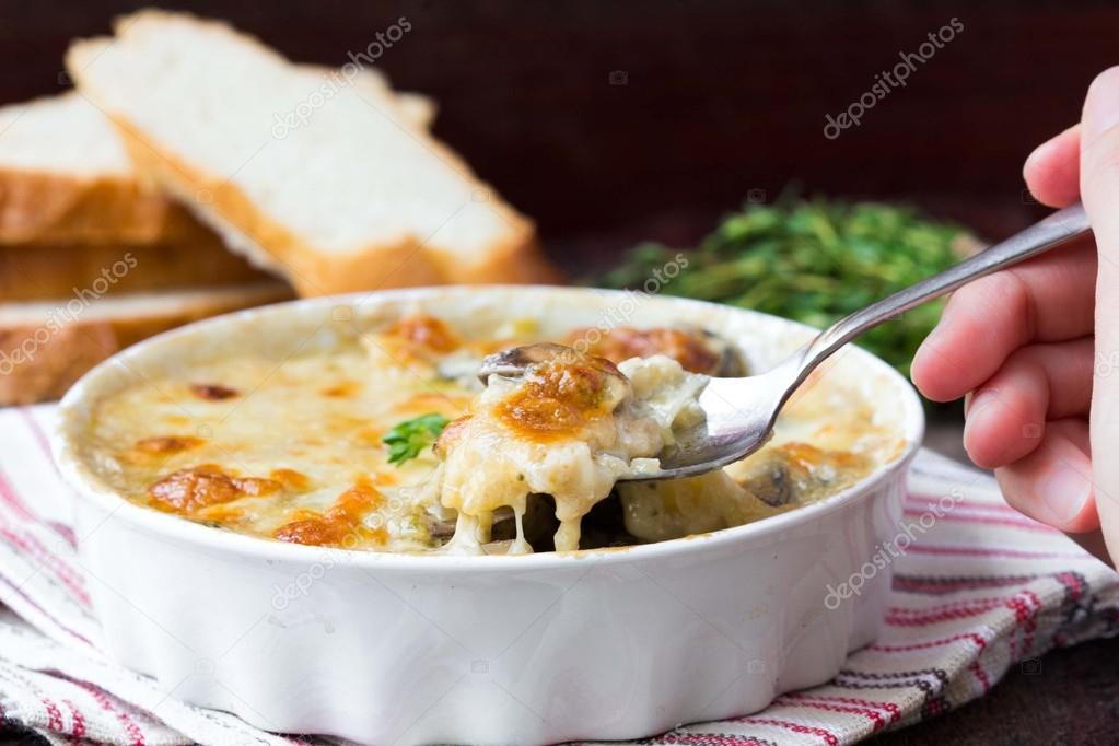 Mushrooms gratin with cream, cheese, French dish julienne — Stock Photo
