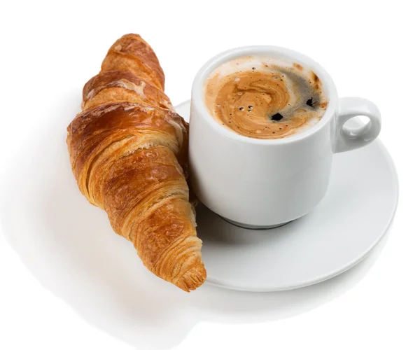 Croissant y una taza de delicioso café — Foto de Stock