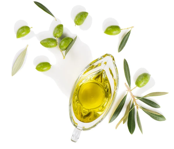 Olive oil and olive branch, above view. — Stock Photo, Image