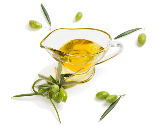 Aceite de oliva y rama de olivo — Foto de Stock