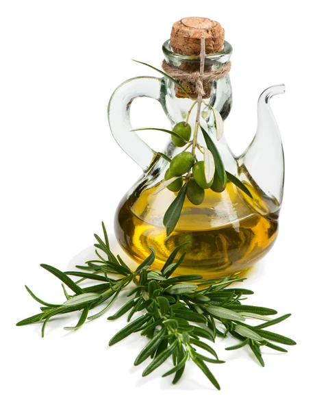 Fresh twigs of rosemary and olive oil. — Stock Photo, Image