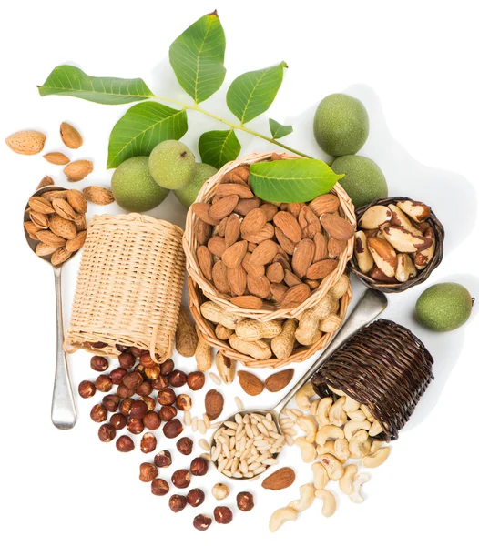 Various nuts in a baskets — Stock Photo, Image