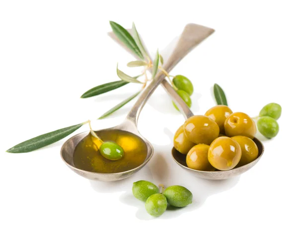 Olive oil and green olives — Stock Photo, Image